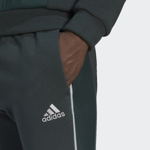 Spodnie męskie adidas Essentials Reflect-In-The-Dark Fleece Pants zielone HL6926